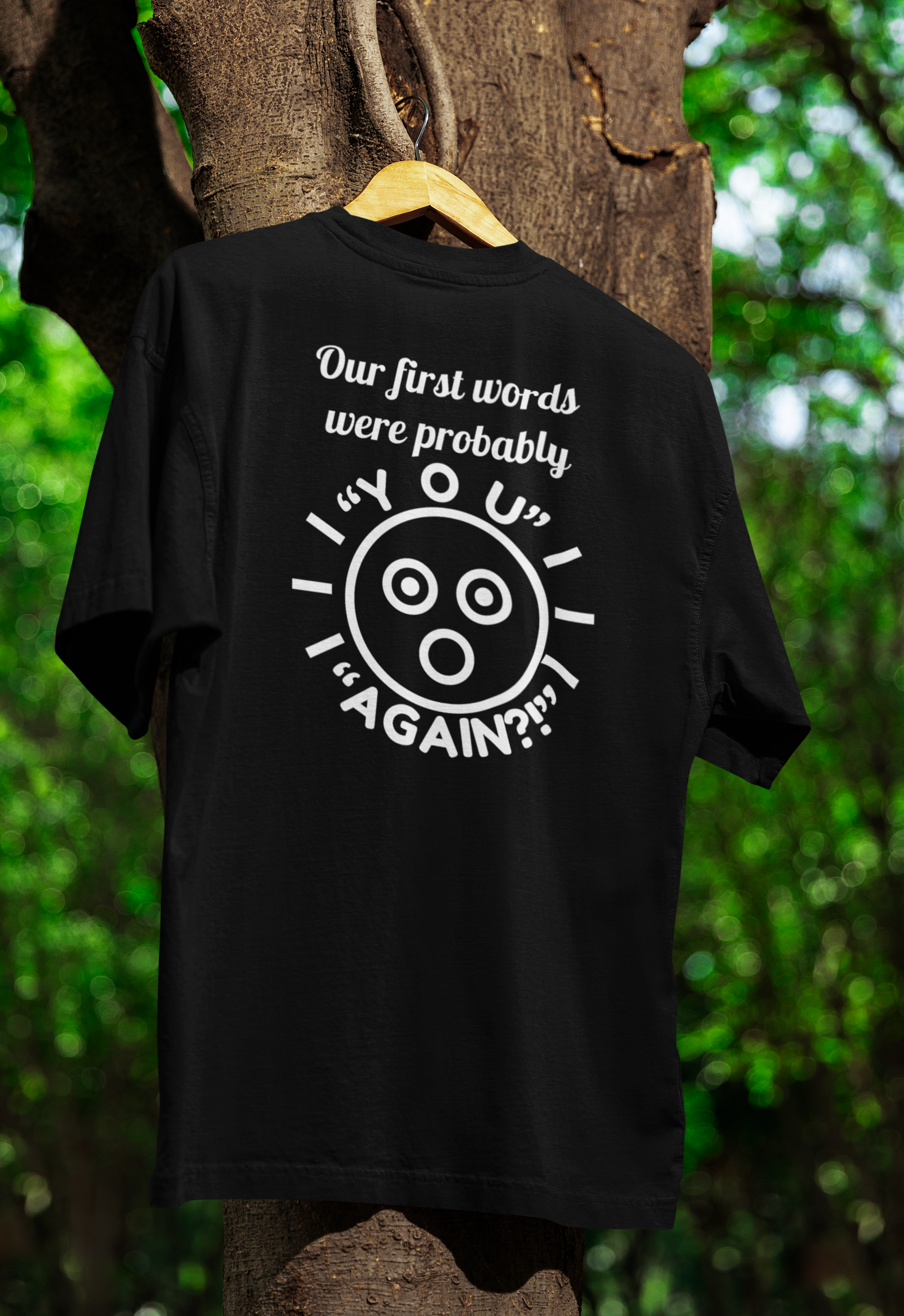 Black t-shirt for twins with white text and design hanging on a tree