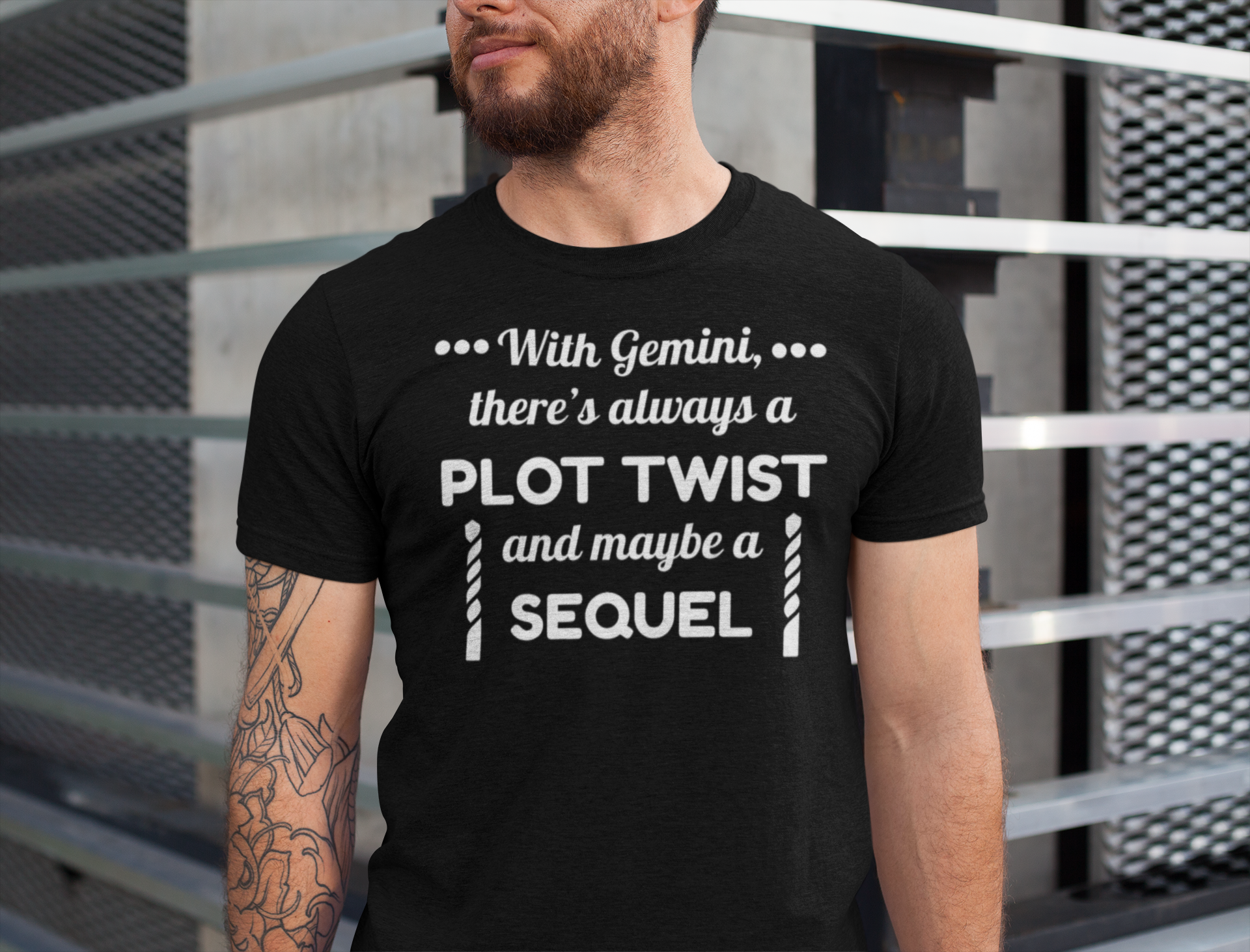 Person wearing a black t-shirt with text about Gemini zodiac sign