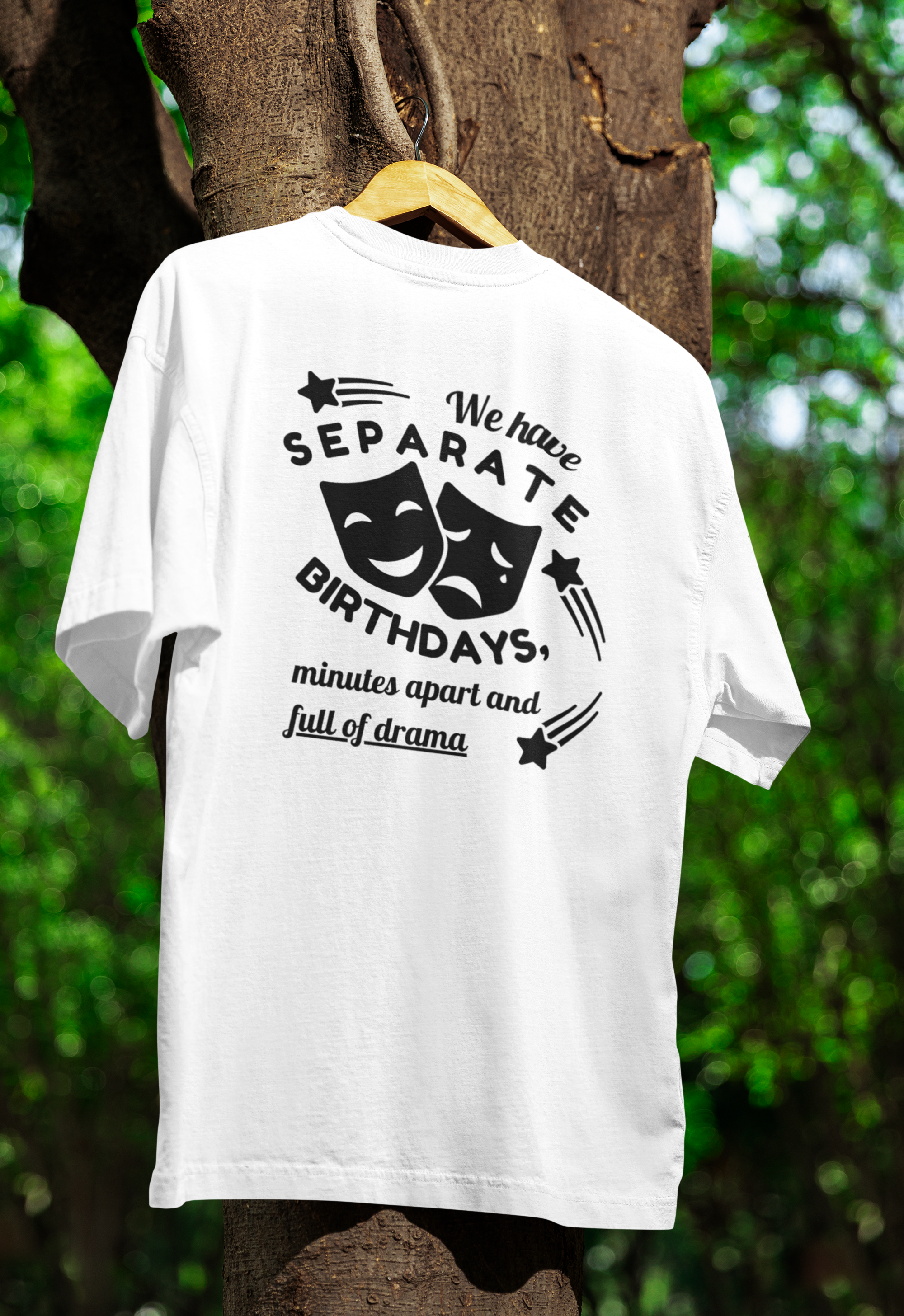 white funny twin t-shirt hanged on a tree