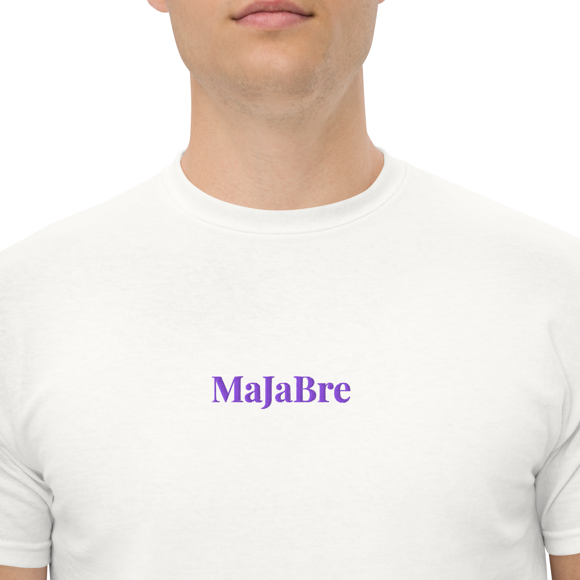A man wearing white twin shirt with purple MaJaBre sign. 