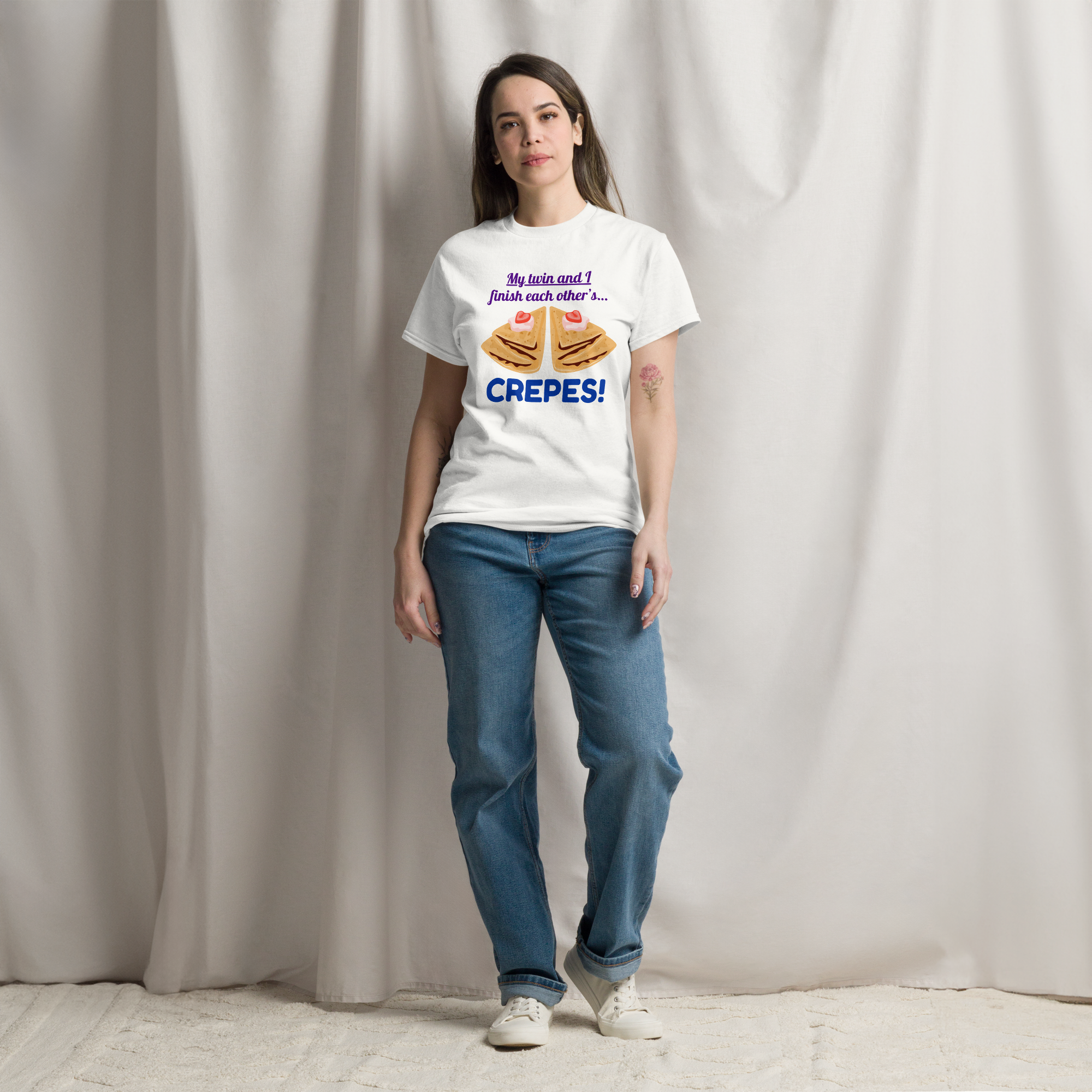 A woman wearing white Twin vibes t-shirt - crepes (blue)