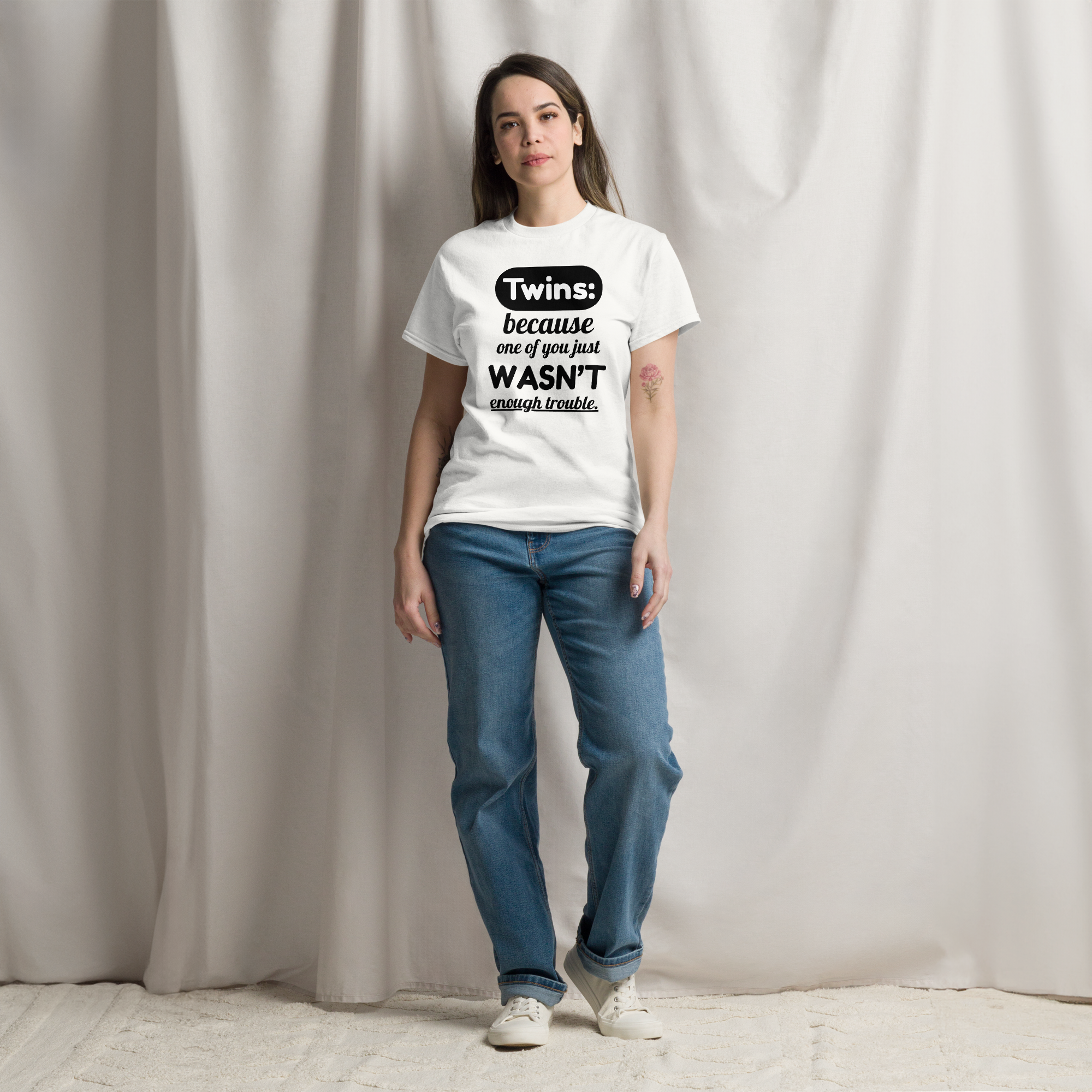 a woman wearing white twin shirt for adults