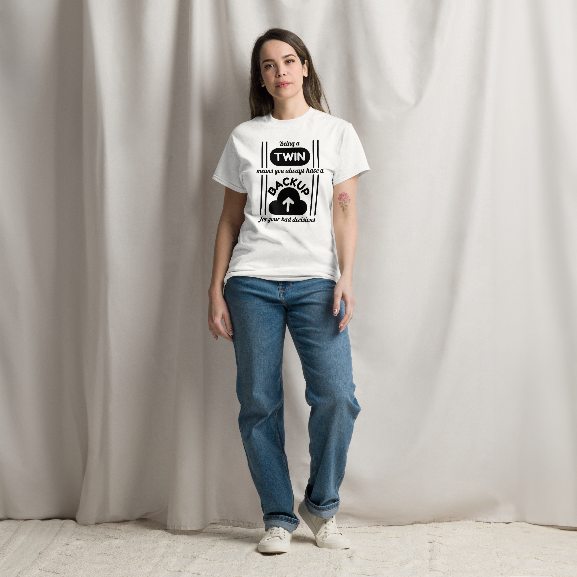 A woman wearing white twin shirt for adults