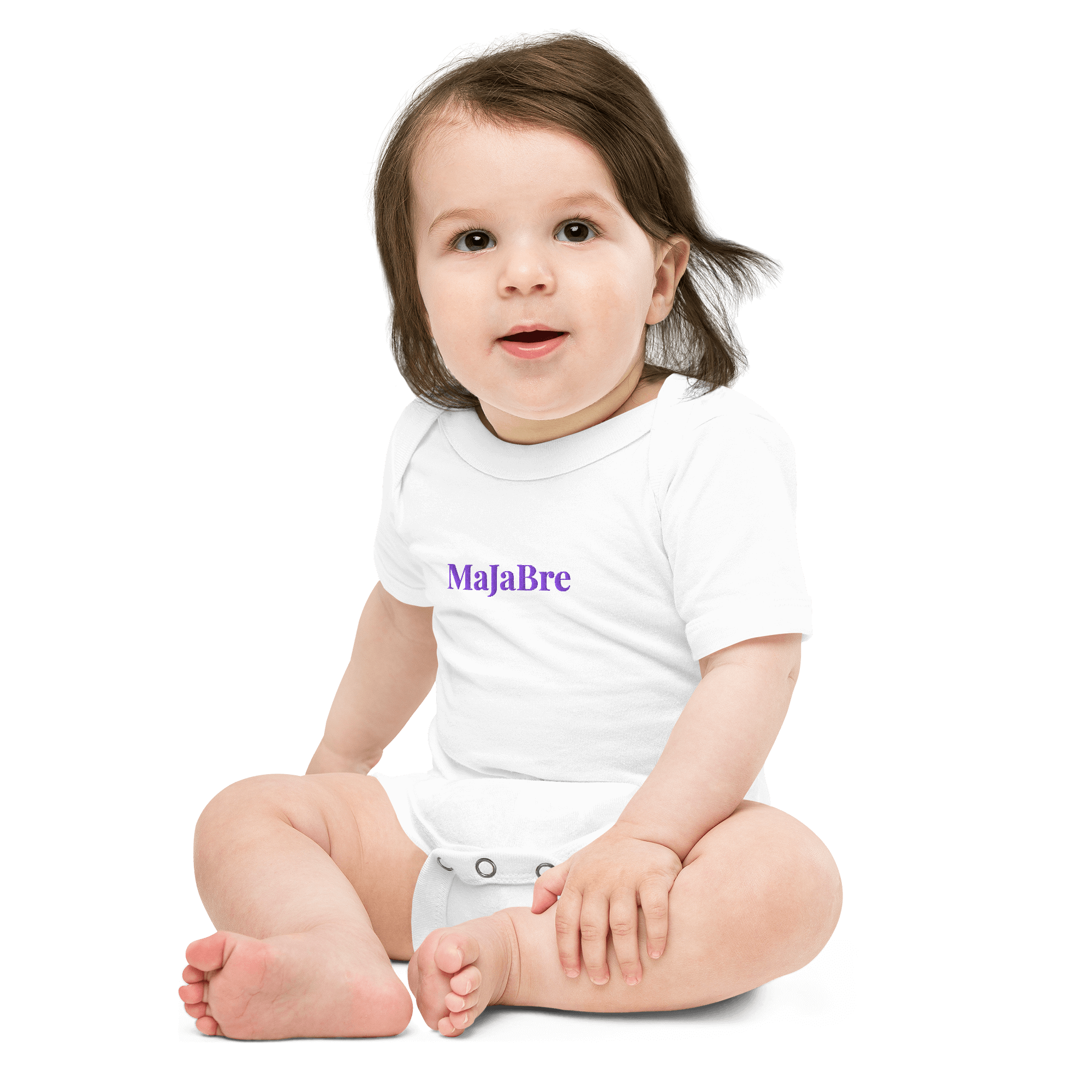 a baby wearing white twin bodysuit with purple majabre sign